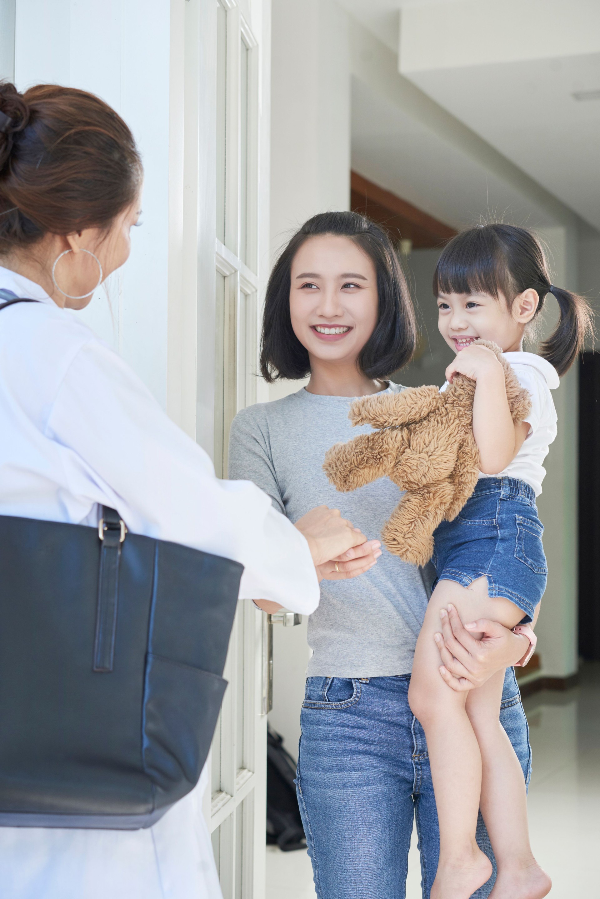 Doctor coming to her patient's house
